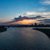 夕焼けを覆う雲
