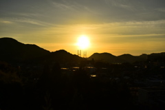 女神大橋に乗った夕日