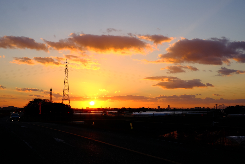 夕日と雲と鉄塔