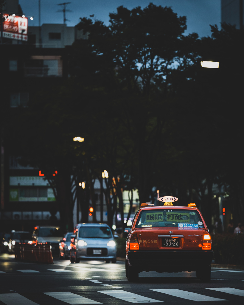 オレンジ色のタクシー