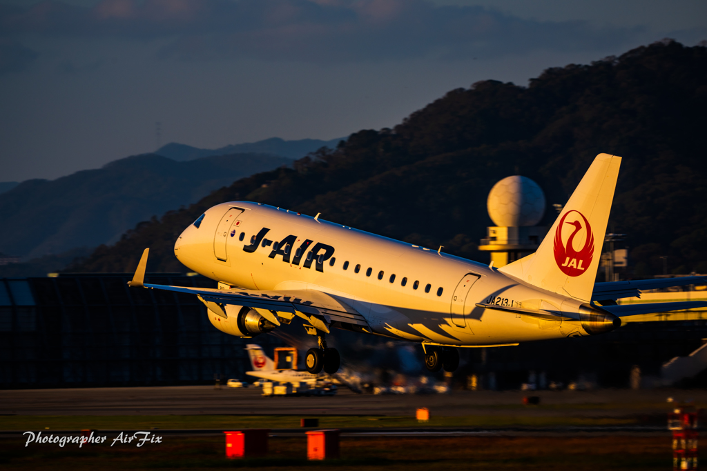 J-AIR JA213J sunset
