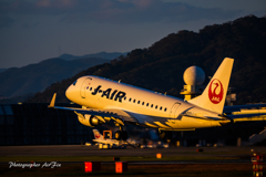 J-AIR JA213J sunset