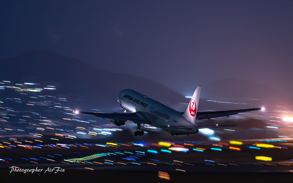 ITM Skypark in Night JAL Take-off