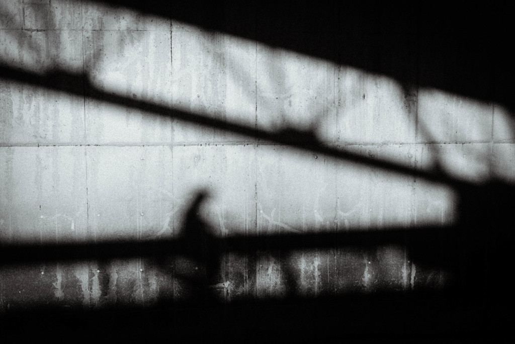 Shadow under a bridge