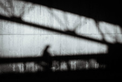 Shadow under a bridge