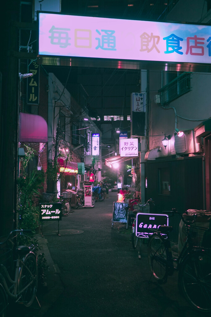 誘