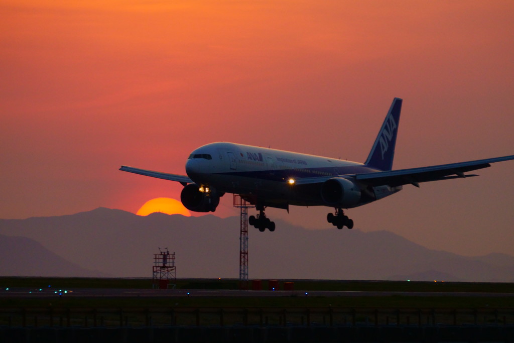 沈む夕日と共に