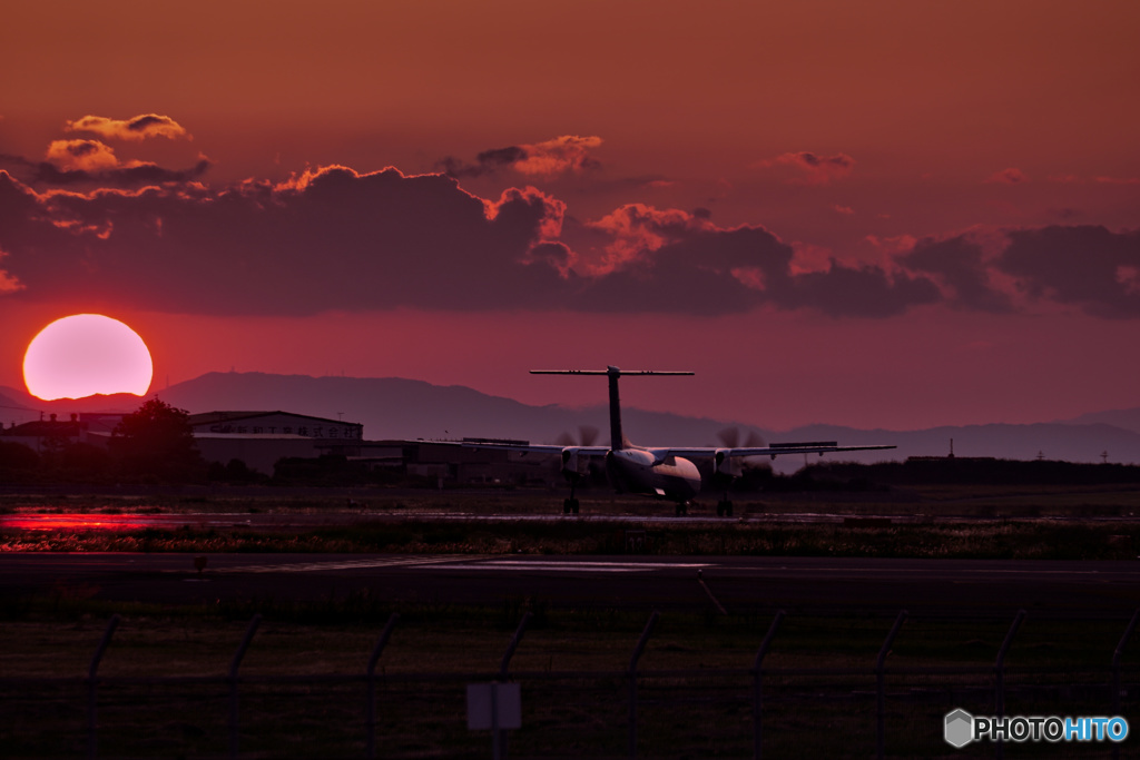 沈む夕日を見ながら