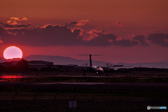 沈む夕日を見ながら