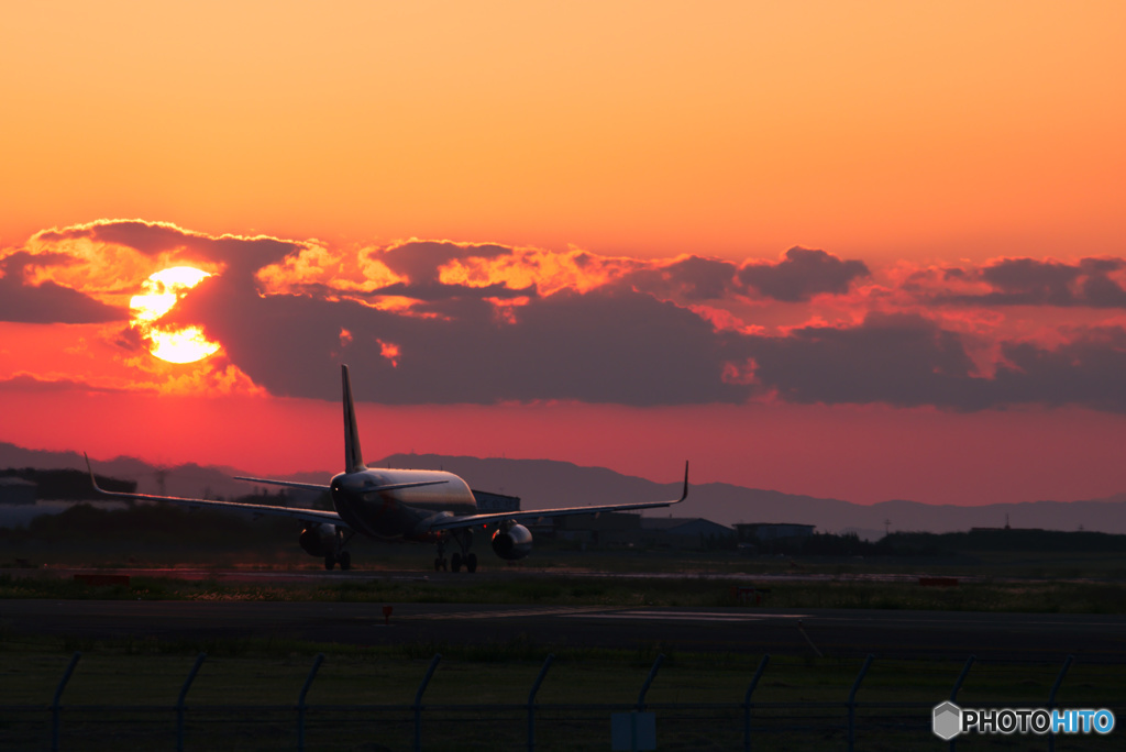 夕日に別れを告げながら
