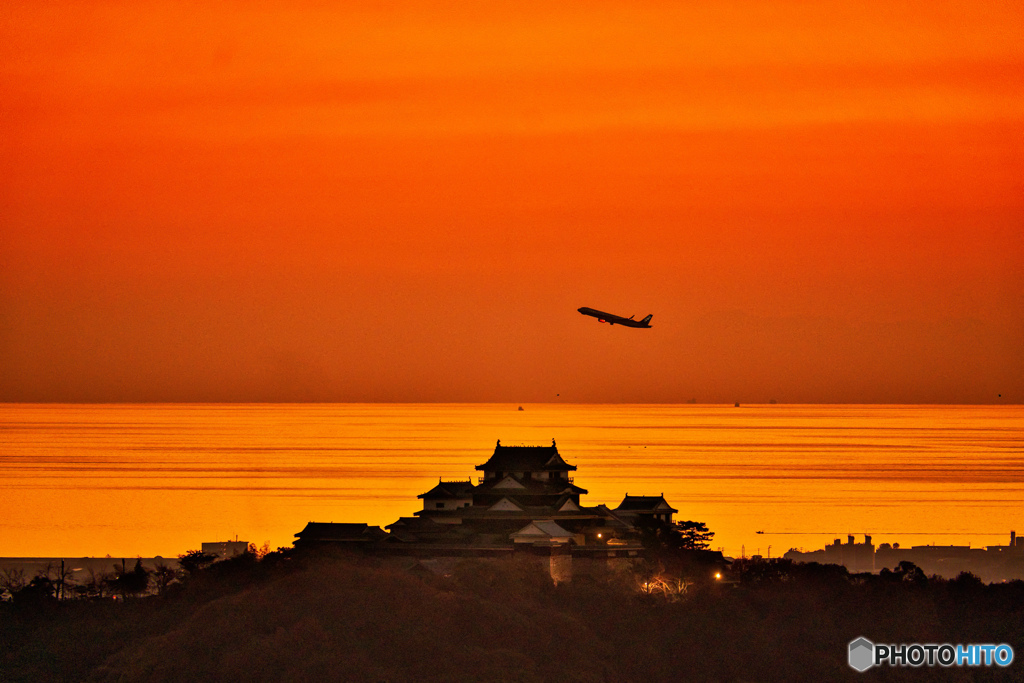 日没の空へ