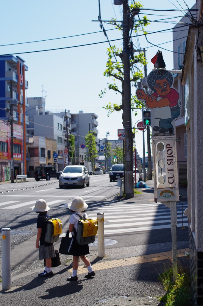 見守る　床屋さん