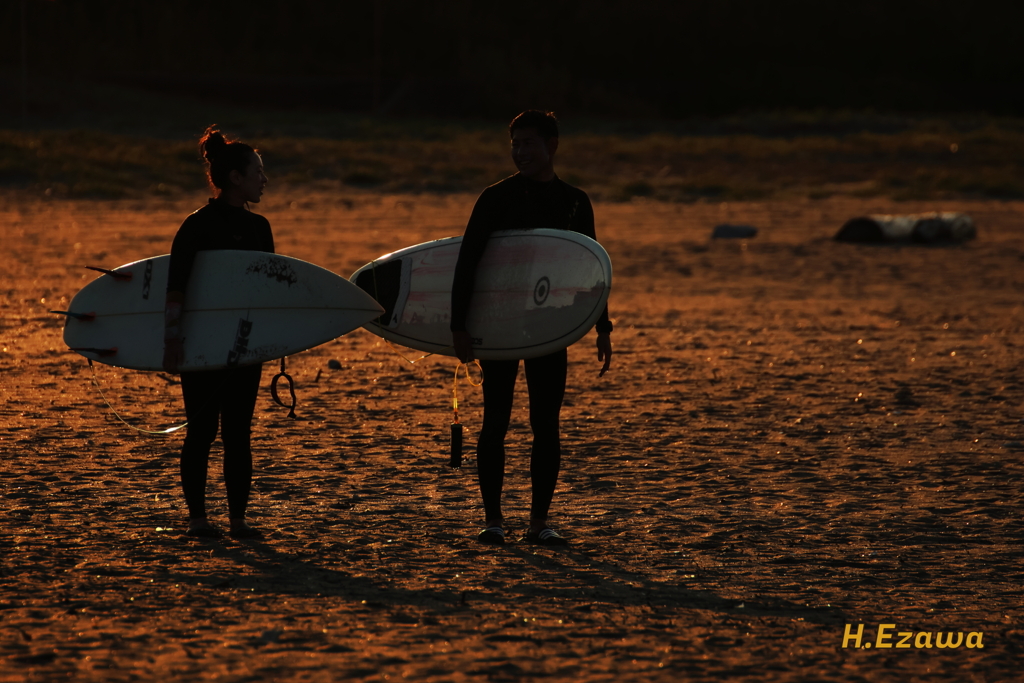 two surfers