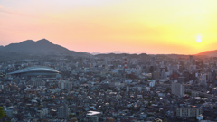 Ｋ市2021　4月　夕陽と皿倉山