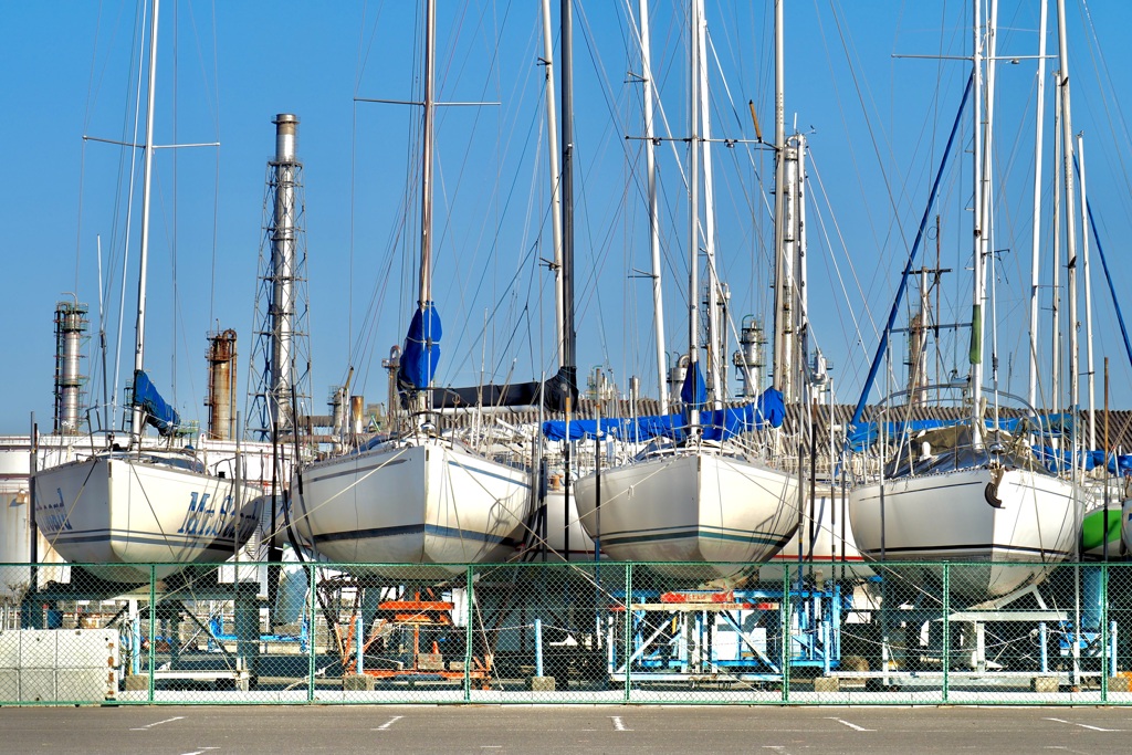 An area lined with yachts.