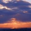 雲から夕陽