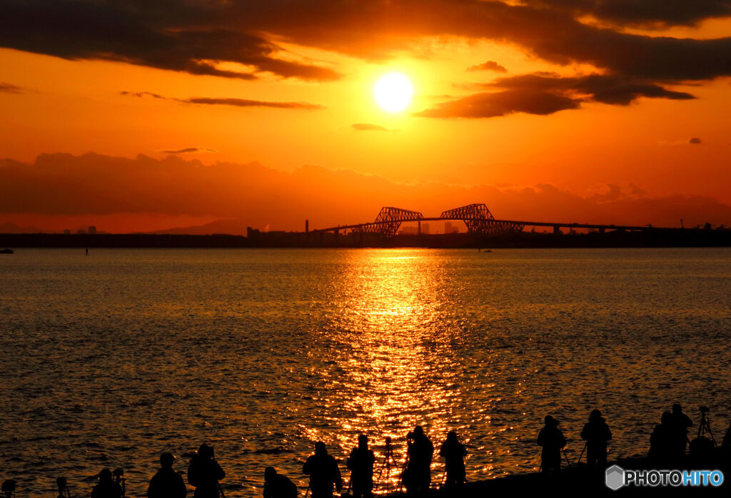 夕陽とカメラマン