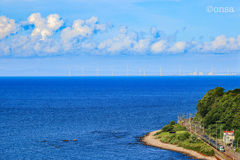 白雲、海を渡る