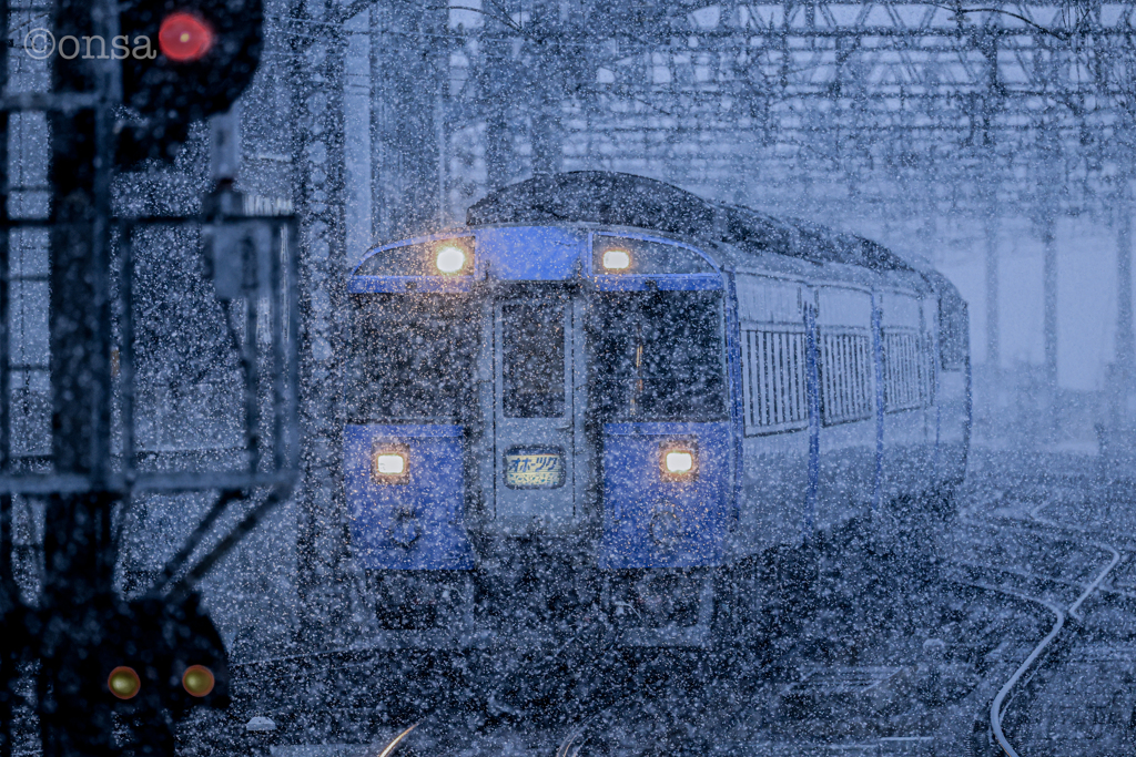 吹雪く、春に