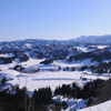 悠久の頚城山並み