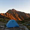 朝焼けの劔岳とマイテント