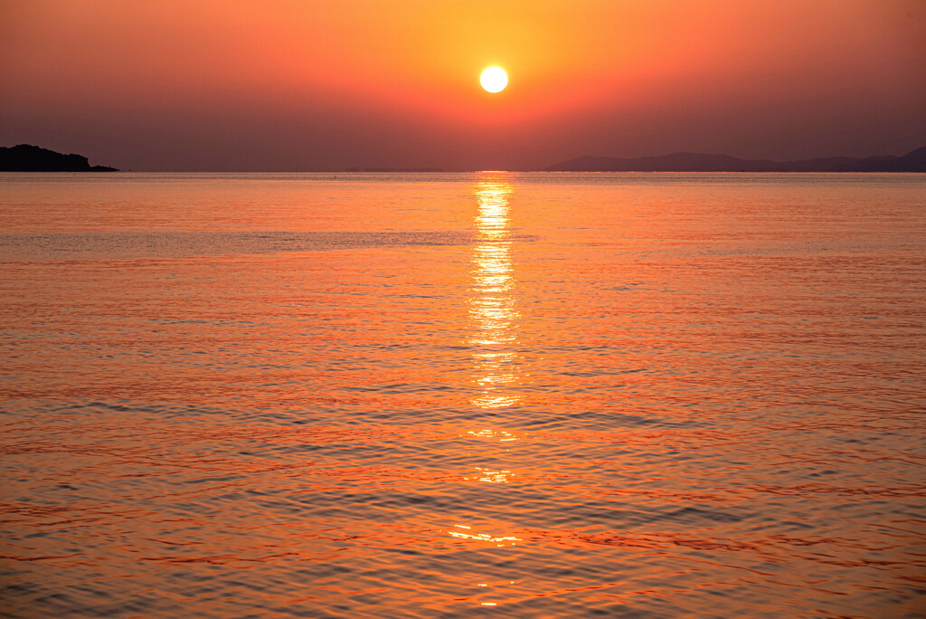 足湯から見る沈みゆく夕日