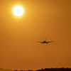 夕日と飛行機