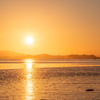 夕日と干潟と海のグラデーション
