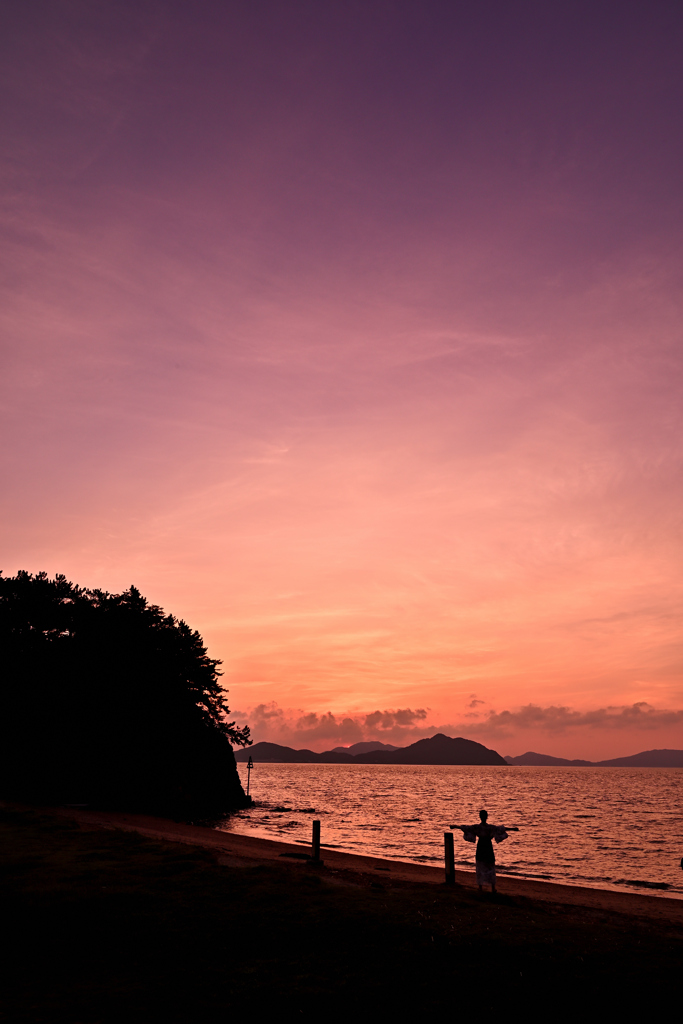 夕日に向かって深呼吸