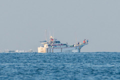 水平線上の釣り人達