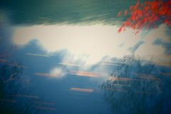 流されて