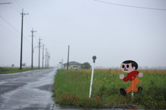 雨の中を駆けるとび太くん
