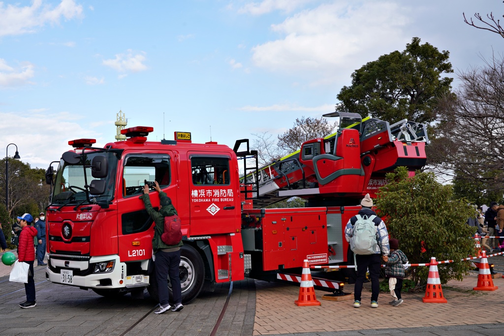 消防車を写す人