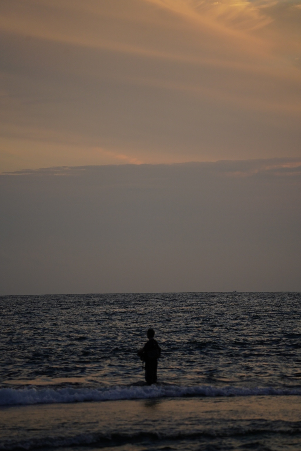 釣り人と夕日