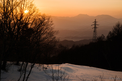 夕景と雪