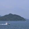 能古島と釣り船