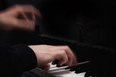 Hands on piano