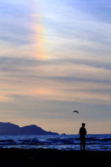 夕方の虹と釣り人