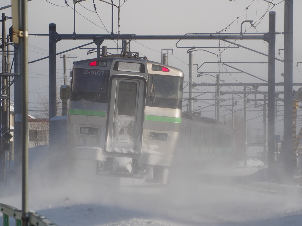 後追い雪煙