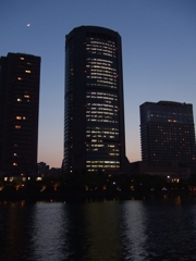 a crescent and three buildings