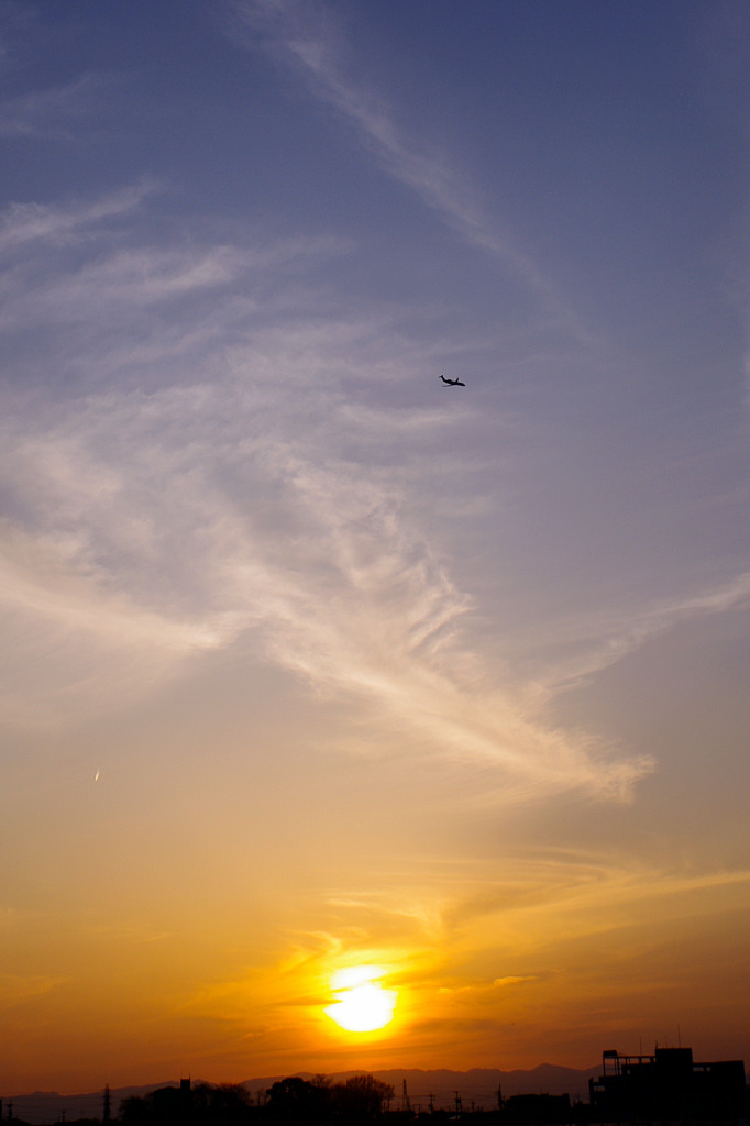 夕日と飛行機