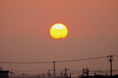 夕日と稜線の鉄塔