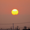 夕日と稜線の鉄塔