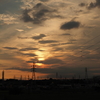 鉄塔と夕日と雲