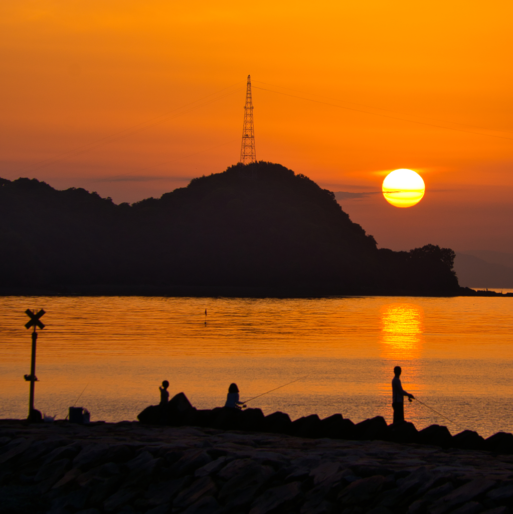 夕陽　釣り人