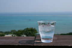 A glass of ocean blue water