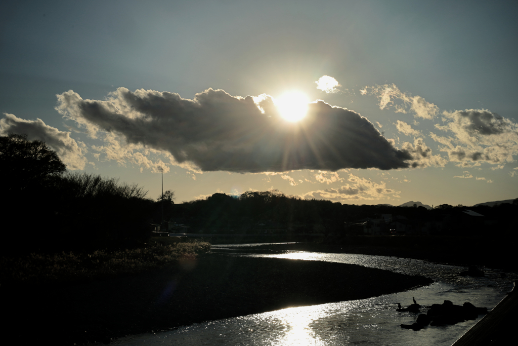 雲の上から日の出
