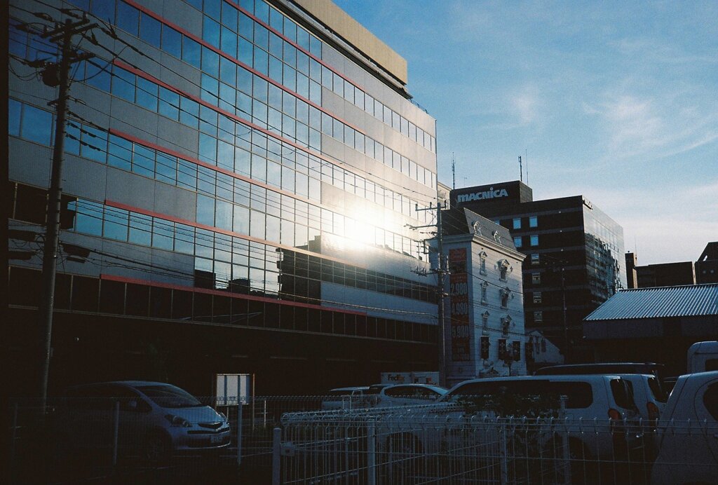 Some buildings are lit up by the sunbeam