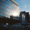 Some buildings are lit up by the sunbeam