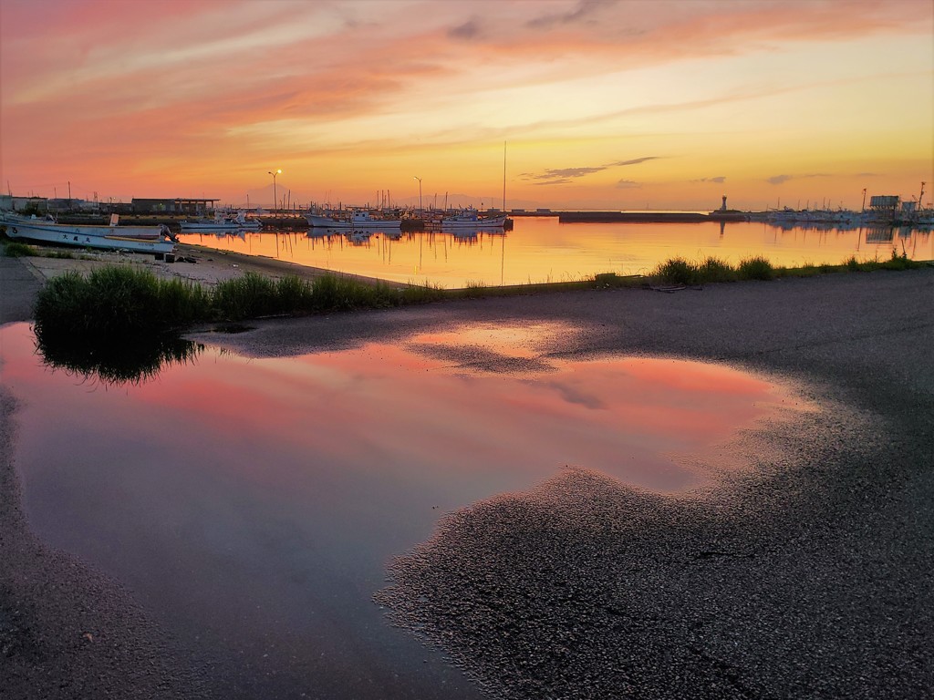 朱を増す夕陽